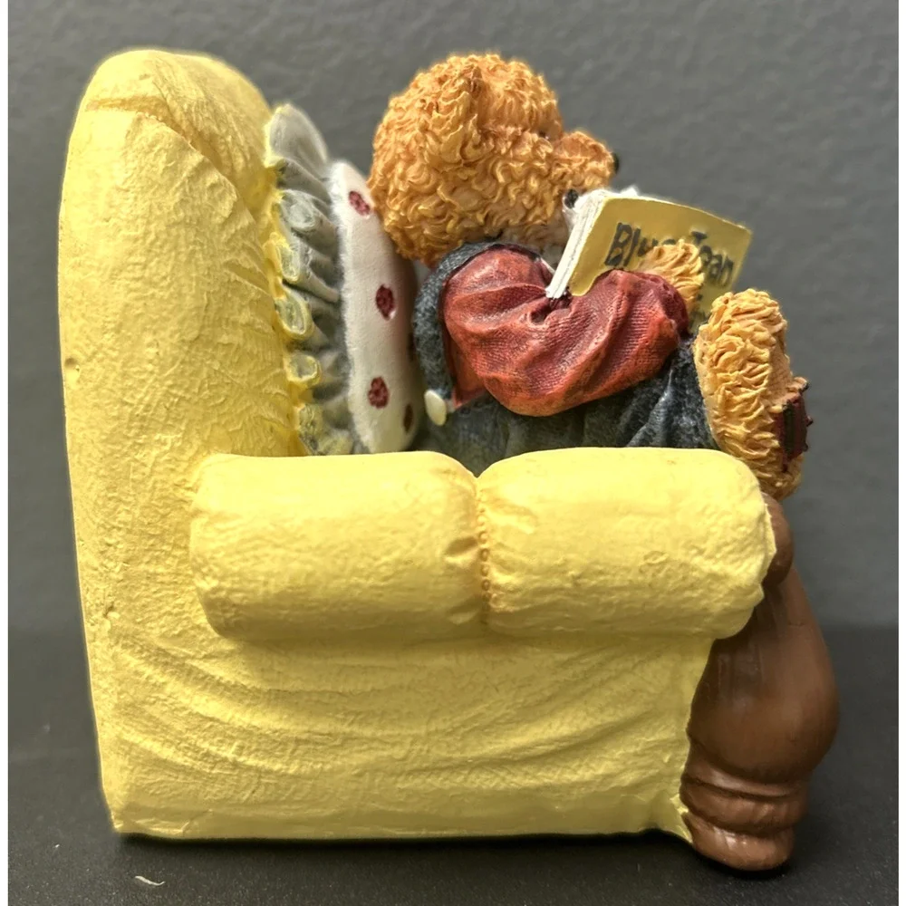Baby Bear Sitting In Yellow Chair Reading Book With Stuffed Animal Toy Figurine